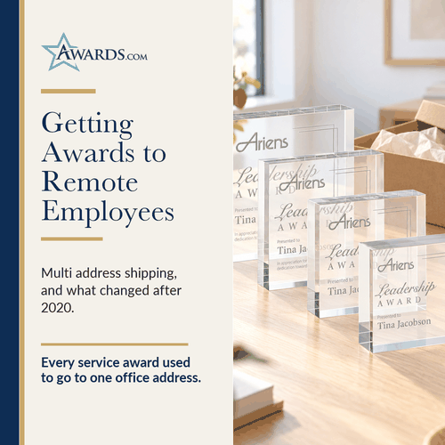 Clear acrylic award beside an open gift box