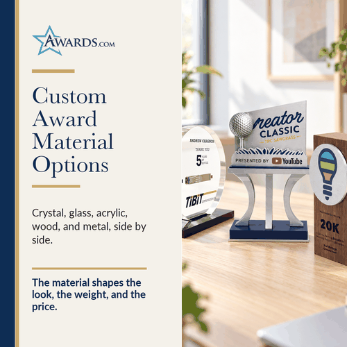 Acrylic, brushed aluminium and walnut awards side by side on a desk