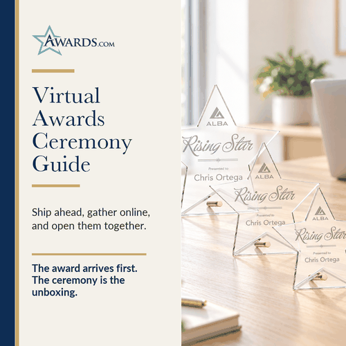 Gold acrylic star award on a desk beside a laptop